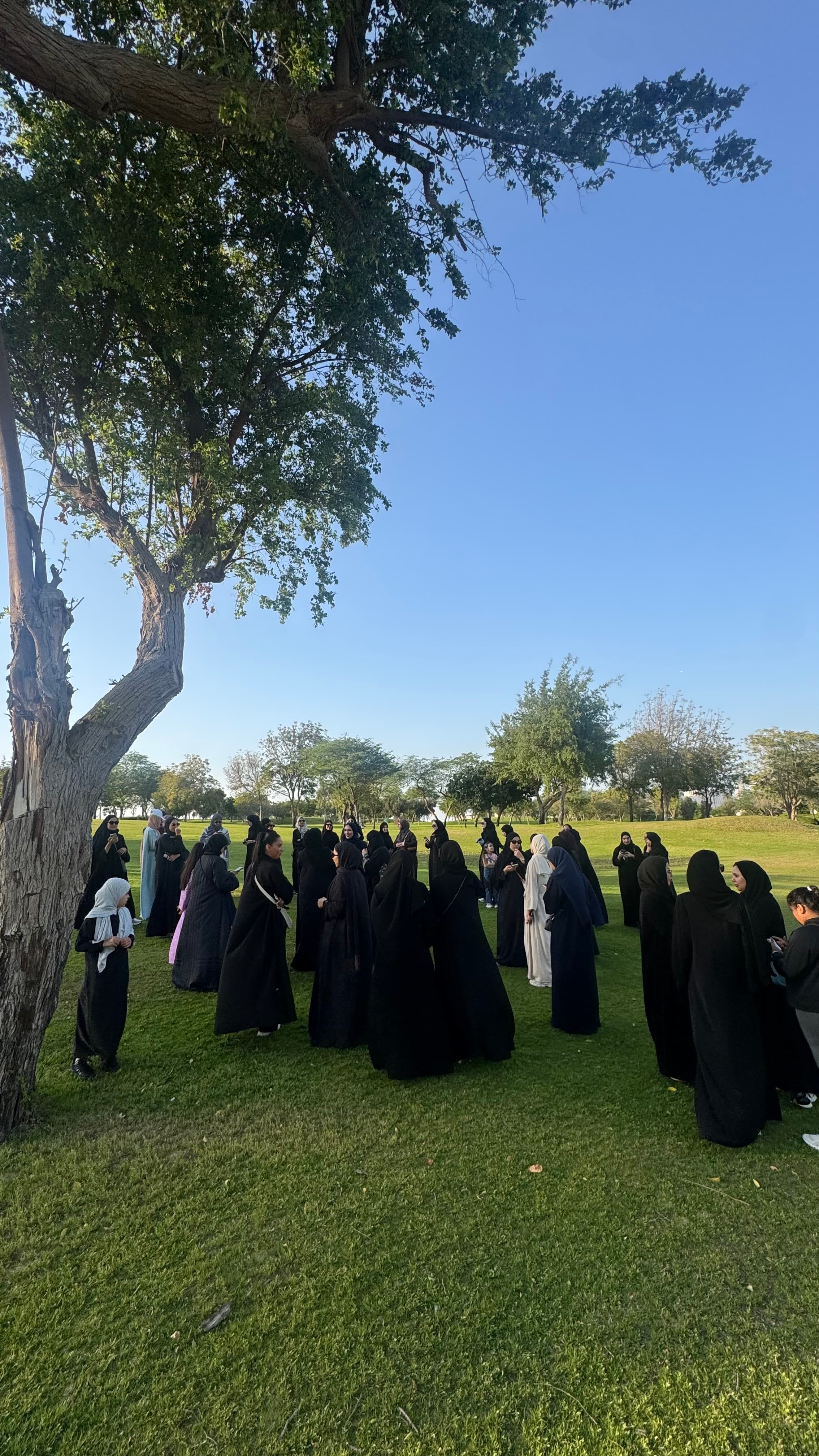 Abaya Walk community walking together in the park